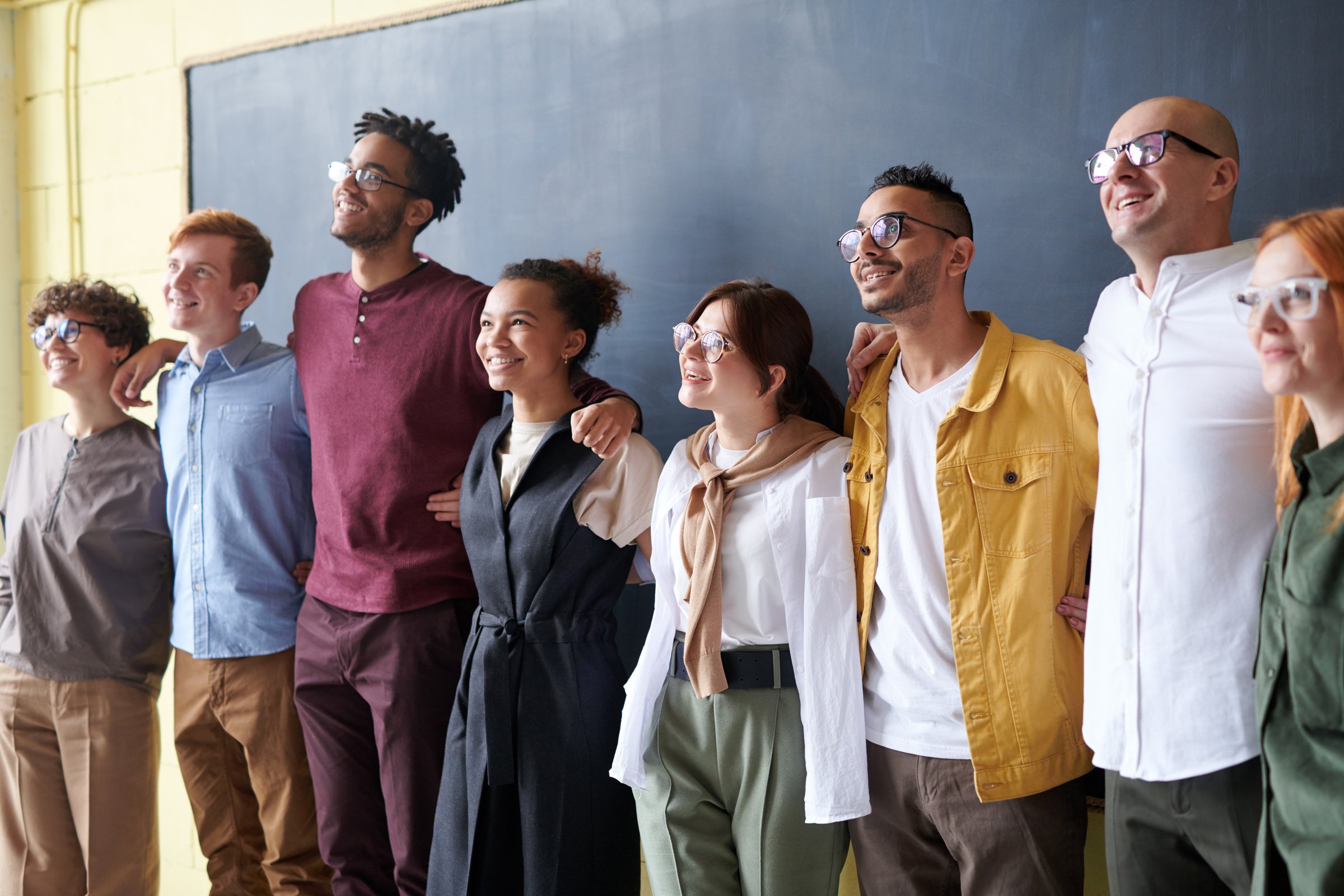 Group photo of a diverse team in the workplace